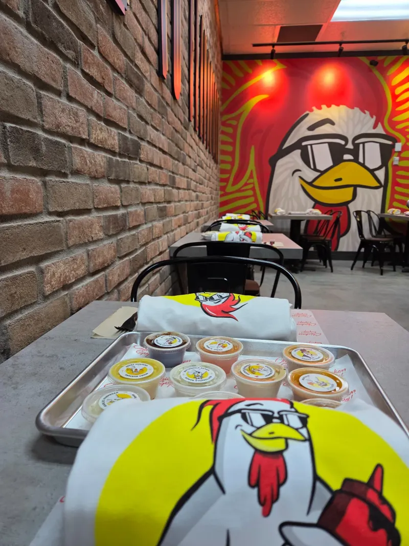 Chicken Guy! counter service area and menu board at Ocala location