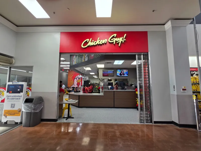 Chicken Guy! signature sauces display at Ocala Walmart location