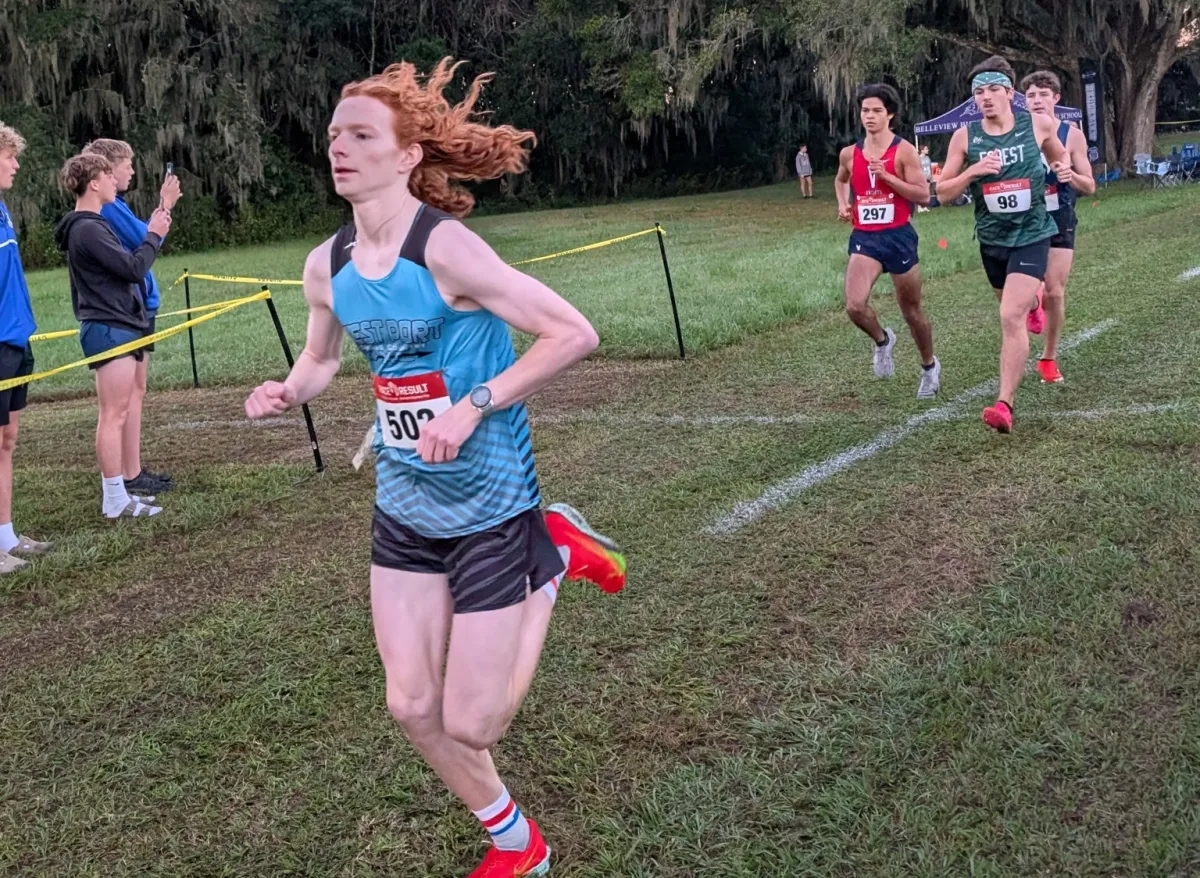 Luke Lombardo wins the boys race at Marion Conference Cross Country Championships